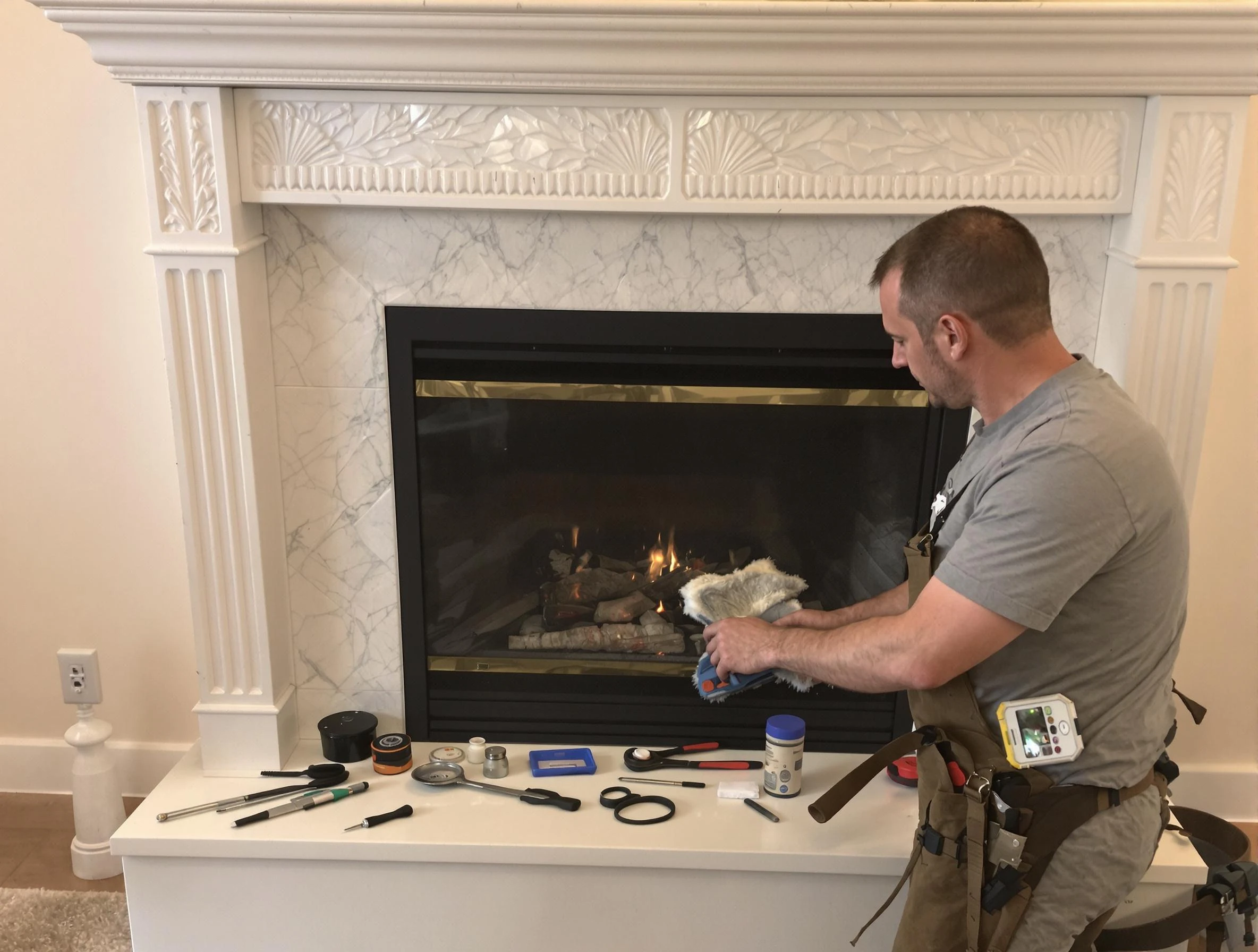 Scottdale Chimney Sweep performing fireplace maintenance in Scottdale, GA